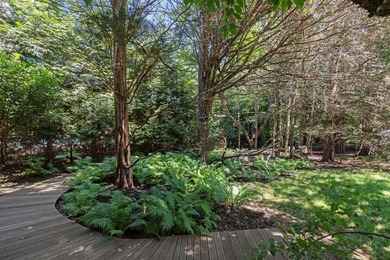 Discover a private Hamptons sanctuary where modern luxury meets - photo 38
