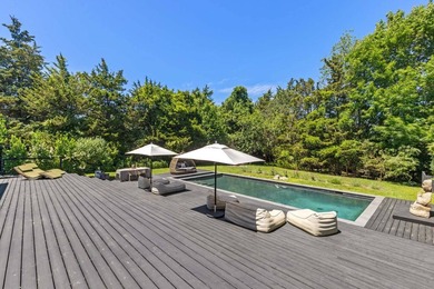 Discover a private Hamptons sanctuary where modern luxury meets - photo 41