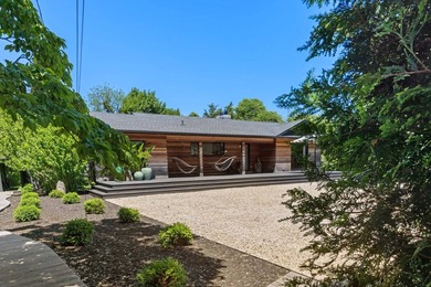 Discover a private Hamptons sanctuary where modern luxury meets - photo 42