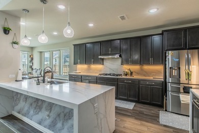 Experience luxury living at its finest in the prestigious - photo 5