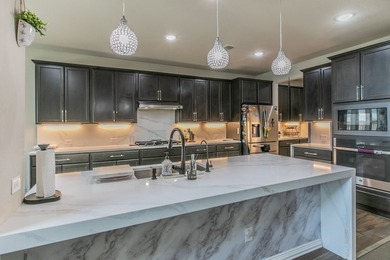 Experience luxury living at its finest in the prestigious - photo 6