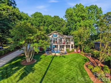 Experience luxury lakefront living in this extraordinary 3BR, 3 - photo 2
