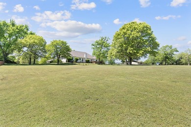 Nestled along the 13th hole of the prestigious Eagle Creek Golf - photo 50