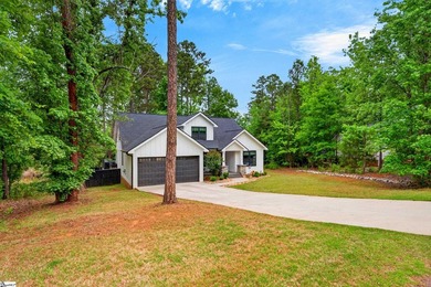 An oversized covered front porch with stained wood ceilings sets - photo 3