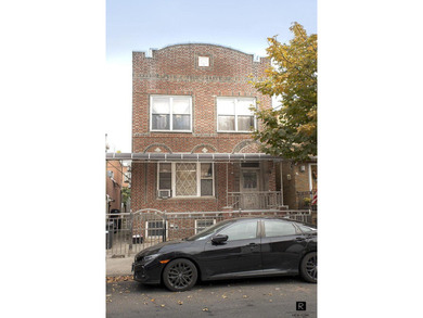 Rare, large, detached, income-producing, 4-family brick building - photo 1