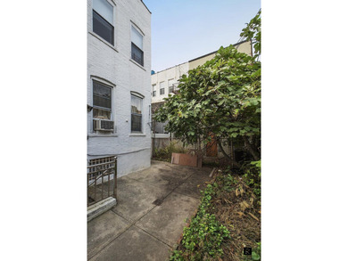 Rare, large, detached, income-producing, 4-family brick building - photo 3