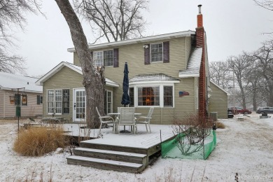 Nestled along the Fox River, this lovely home is a perfect blend - Lake Home For Sale in Mchenry, Illinois