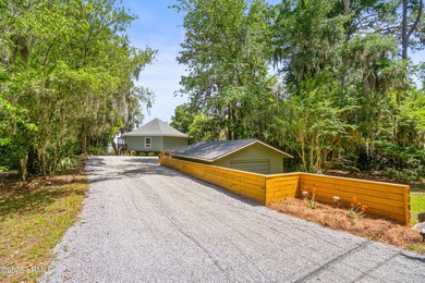 Discover this beautifully updated waterfront house located in - photo 8