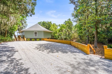 Discover this beautifully updated waterfront house located in - photo 9