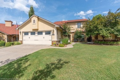 This beautiful 3 bedroom 2 bath garden home located in the - photo 1