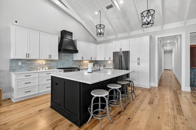 901 Peacock's Point Drive offers a rare single-level waterfront - photo 4
