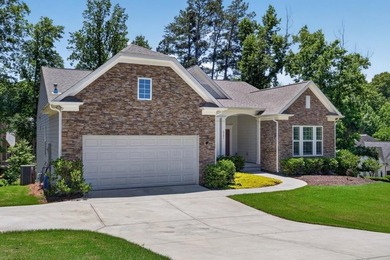Located in the sought-after Woodmont Golf and Tennis community - photo 3