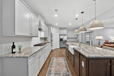 Located in the sought-after Woodmont Golf and Tennis community - photo 10
