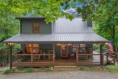 A peaceful lakeside escape awaits in this charming mountain - photo 4