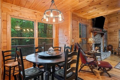 A peaceful lakeside escape awaits in this charming mountain - photo 9