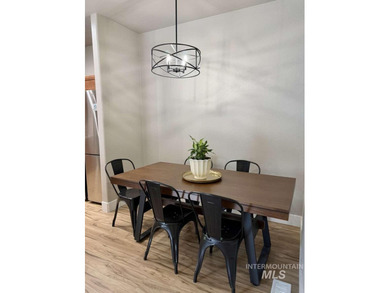 This fully refreshed, fully furnished end-unit townhouse blends - photo 4