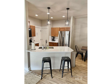 This fully refreshed, fully furnished end-unit townhouse blends - photo 9
