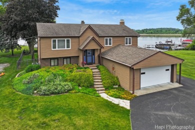 Bright, Beautiful & Ready for Chain Lake Life on Redhead Lake! - Lake Home For Sale in Ingleside, Illinois
