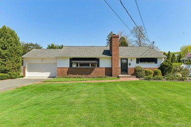 Get ready for summer in this lovely three bedroom ranch in the - photo 1