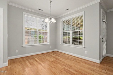 Beautiful brick ranch with custom moldings, tray ceilings, and a - photo 11