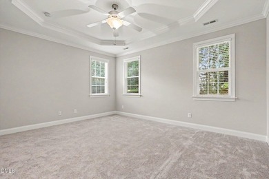 Beautiful brick ranch with custom moldings, tray ceilings, and a - photo 16