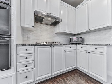Welcome to this stately 5-bedroom, 4-bath home situated on a - photo 19