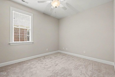 Beautiful brick ranch with custom moldings, tray ceilings, and a - photo 21