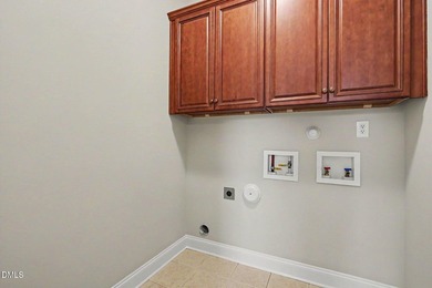Beautiful brick ranch with custom moldings, tray ceilings, and a - photo 23