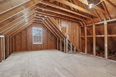 Beautiful brick ranch with custom moldings, tray ceilings, and a - photo 24