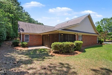 Beautiful brick ranch with custom moldings, tray ceilings, and a - photo 25