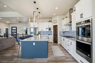 Experience elevated Colorado living at TPC Colorado. Backing - photo 13
