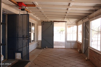 What a find...stucco 4BR/2BA home on 4 acres...covered front