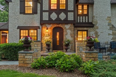 This exceptional 1928 Tudor is nestled in the sought-after - photo 2
