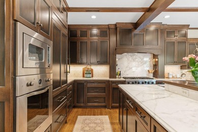 This exceptional 1928 Tudor is nestled in the sought-after - photo 6