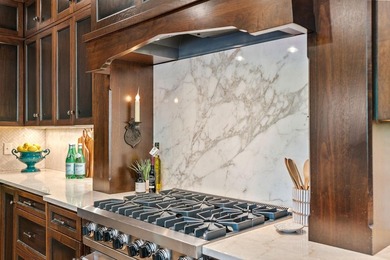 This exceptional 1928 Tudor is nestled in the sought-after - photo 7