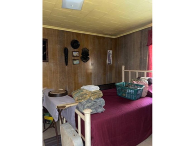Tucked away in a quiet, established neighborhood, this 3-bedroom - photo 2