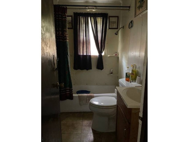 Tucked away in a quiet, established neighborhood, this 3-bedroom - photo 9