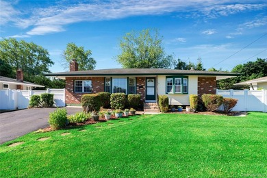 Welcome to 7 Applewood Road located in the Smithtown School - photo 1