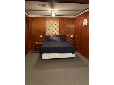 This charming 3-bedroom, 2-bath camp offers the ideal blend of - photo 2