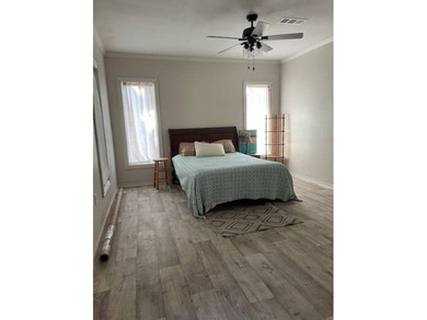 This charming 3-bedroom, 2-bath camp offers the ideal blend of - photo 3
