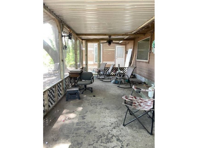 This charming 3-bedroom, 2-bath camp offers the ideal blend of - photo 7