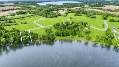 A rare opportunity to find 92' of west-facing sandy lakeshore on - photo 1