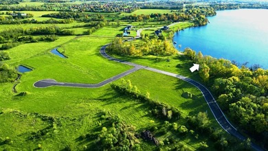 A rare opportunity to find 92' of west-facing sandy lakeshore on - photo 3