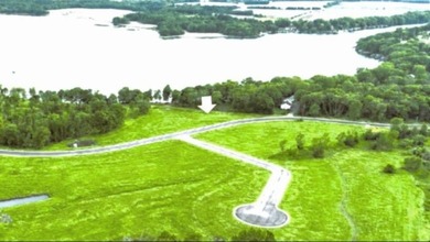 A rare opportunity to find 92' of west-facing sandy lakeshore on - photo 4