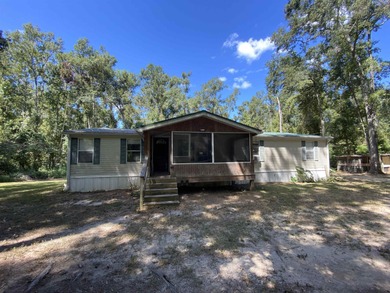 Sneads Smokehouse Lake  Home Active Under Contract in Greenville Florida