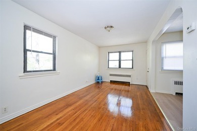 Semi-detached brick 2-family in prime Flushing, across from - photo 9