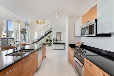 Turnkey! Short sale! Best-priced two-story penthouse in Midtown