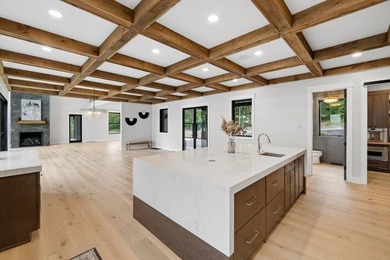 Perched high above the shimmering waters of Lake Winnisquam in - photo 16