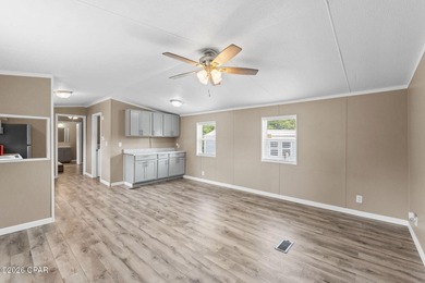Welcome home to this well-cared-for 3-bedroom, 2-bathroom home - photo 3
