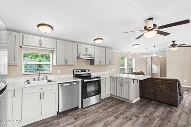This beautifully maintained 3-bedroom, 2-bathroom home nestled - photo 8